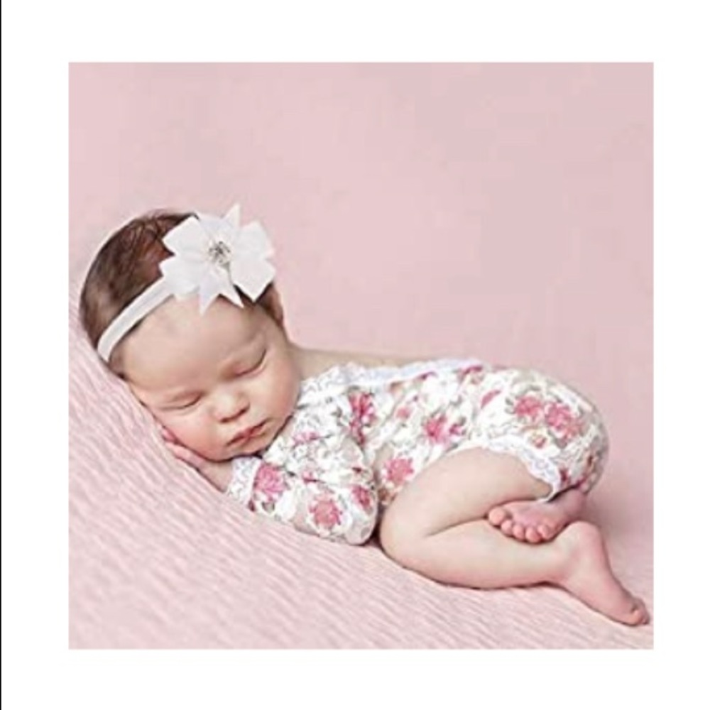 Newborn lace romper with matching bow